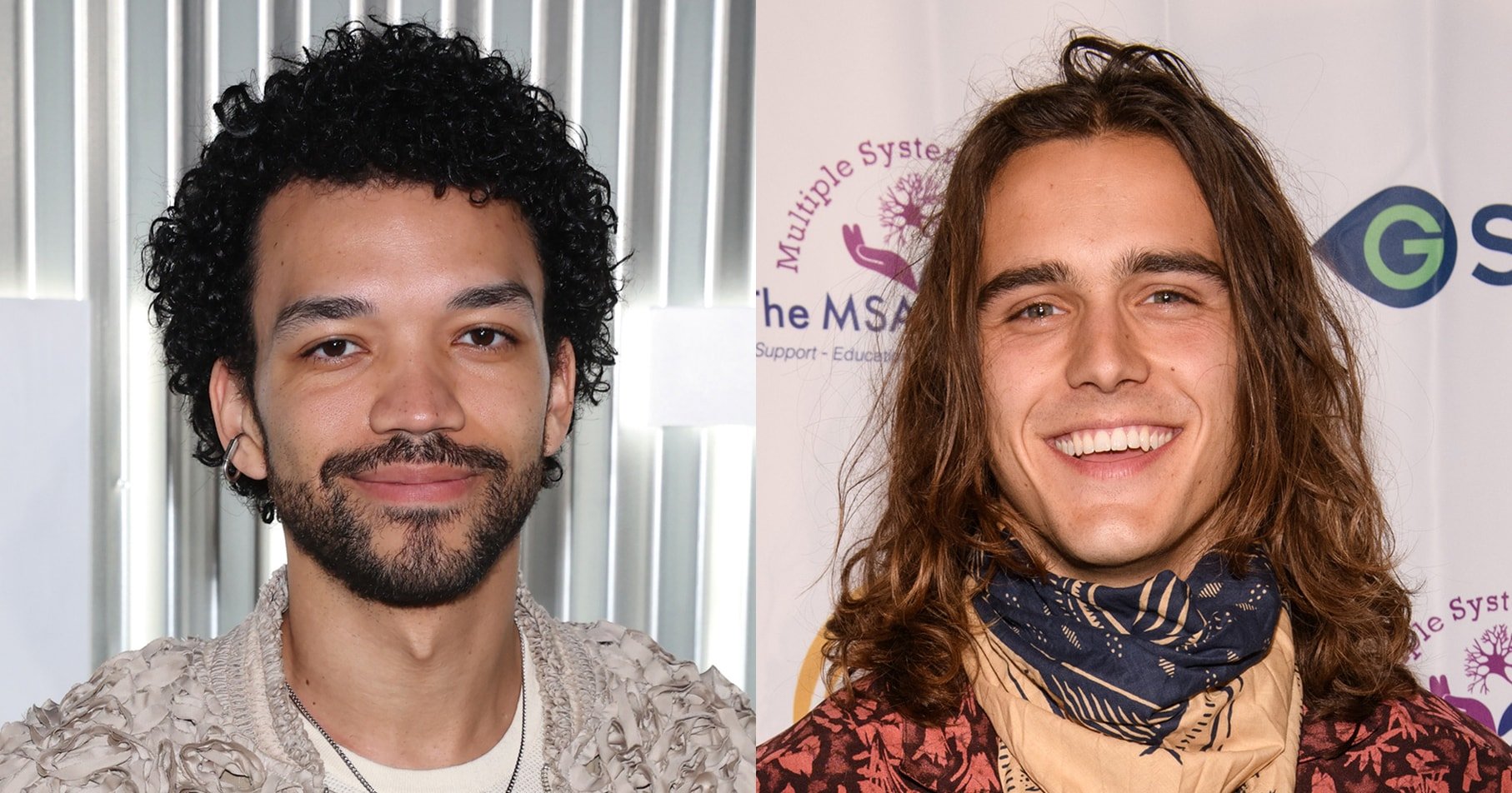 Man with curly black hair wearing a textured cream jacket and matching pants smiling at a Vanity Fair event.