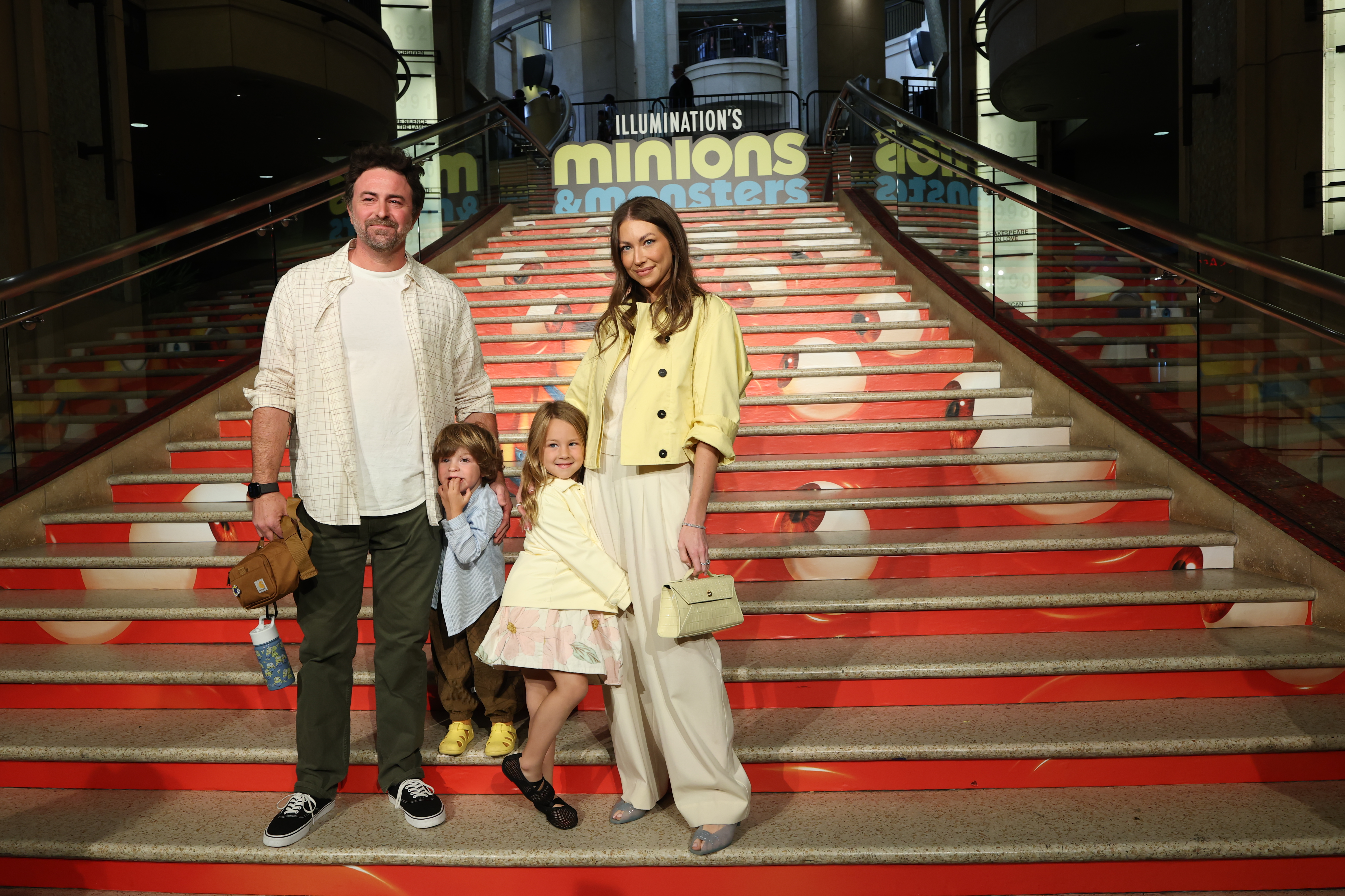 Click to open the image gallery Beau Clark and Stassi Schroeder Clark posing together at the Minions & Monsters premiere at Dolby Theatre in Hollywood