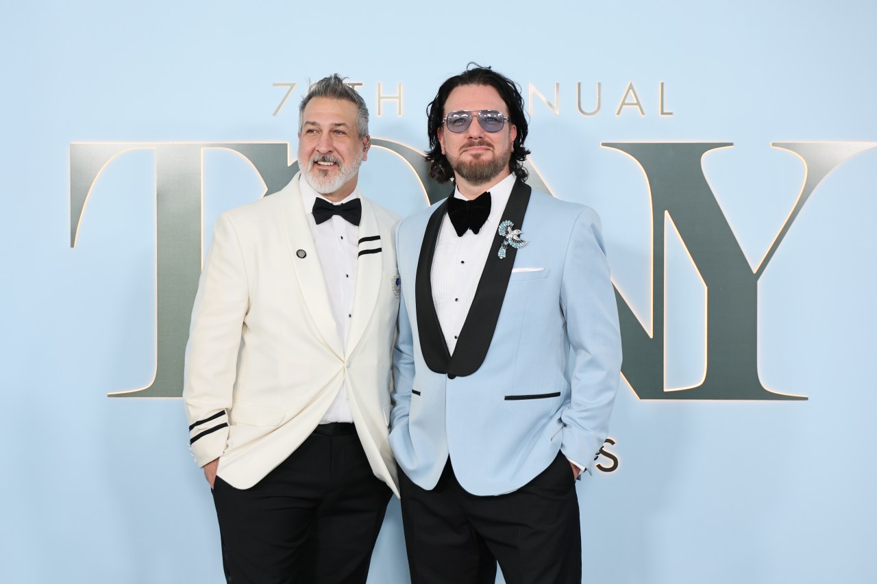 Joey Fatone and JC Chasez posing together at the 79th Annual Tony Awards at Radio City Music Hall