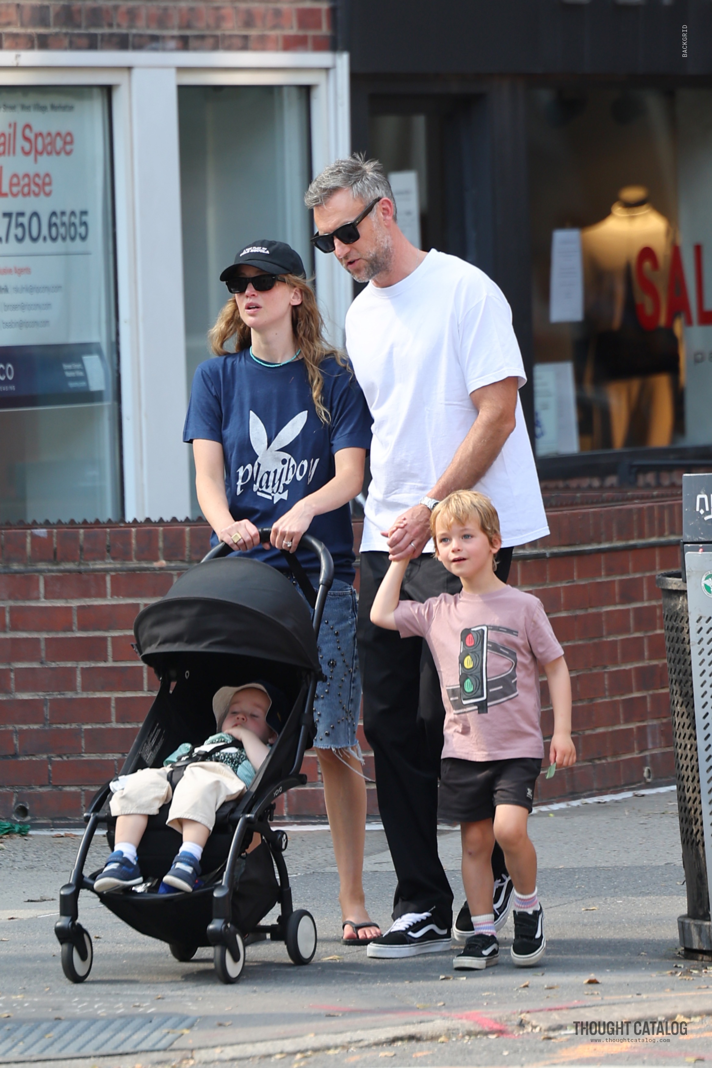 Jennifer Lawrence and Cooke Maroney walking with their children