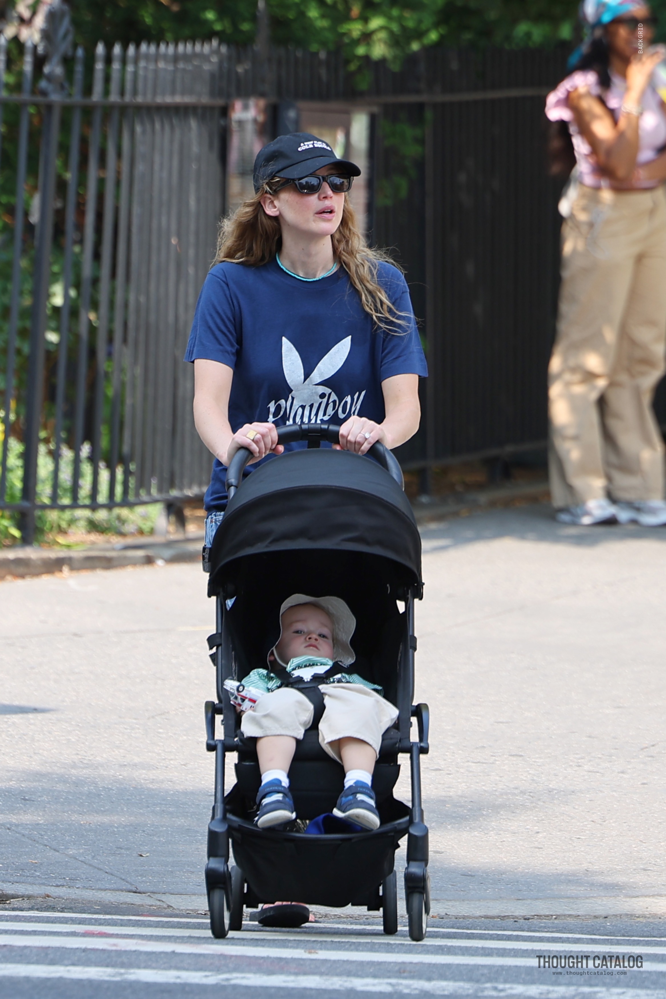 Jennifer Lawrence and Cooke Maroney walking with their children
