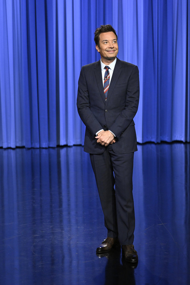 Jimmy Fallon speaking at the Tonight Show monologue podium