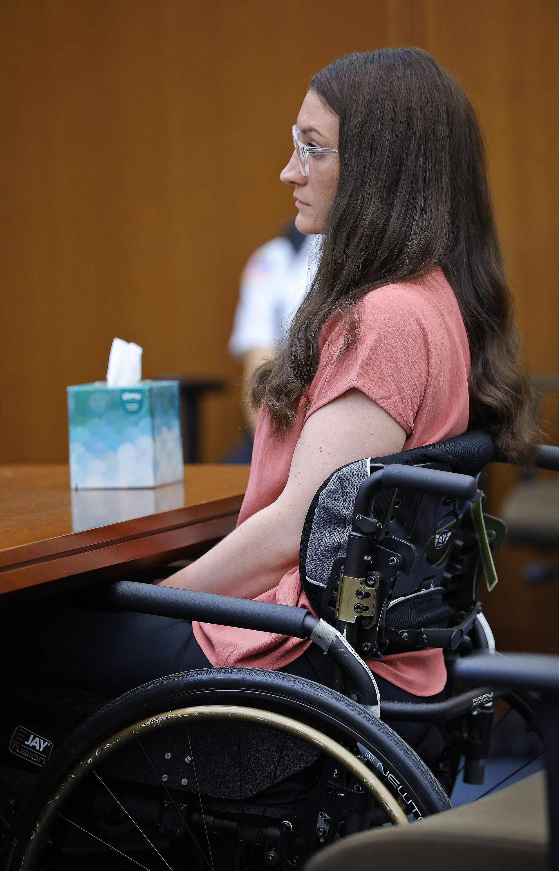 Lindsay Clancy seated in court listening to testimony during her murder trial at Plymouth Superior Court