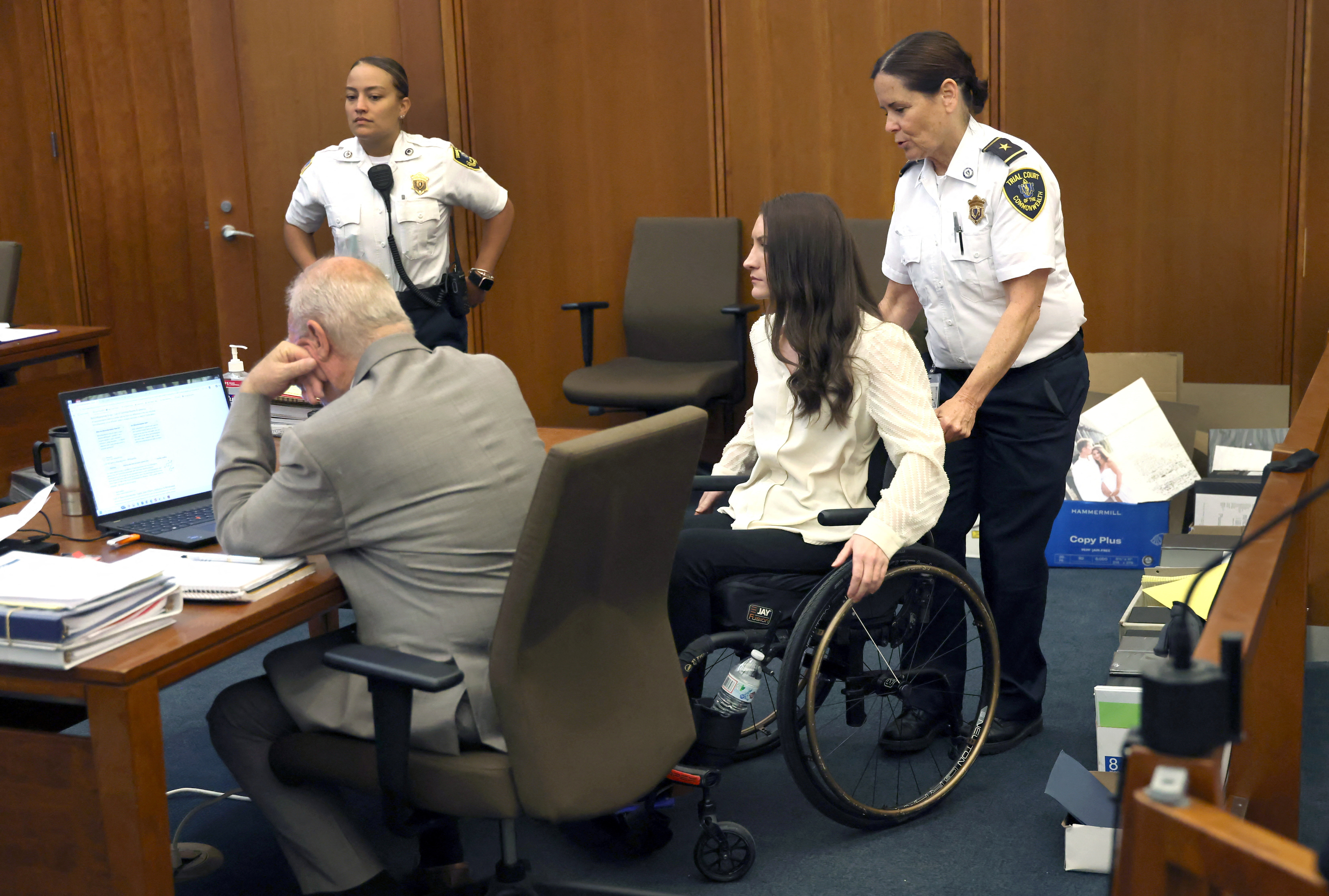 Lindsay Clancy walking into the courtroom alongside defense attorney Kevin Reddington at Plymouth Superior Court
