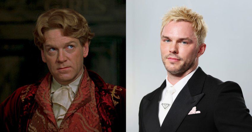 A man in an ornate red and gold velvet robe with a ruffled white cravat looks sideways with a slight smirk, in a period film setting.