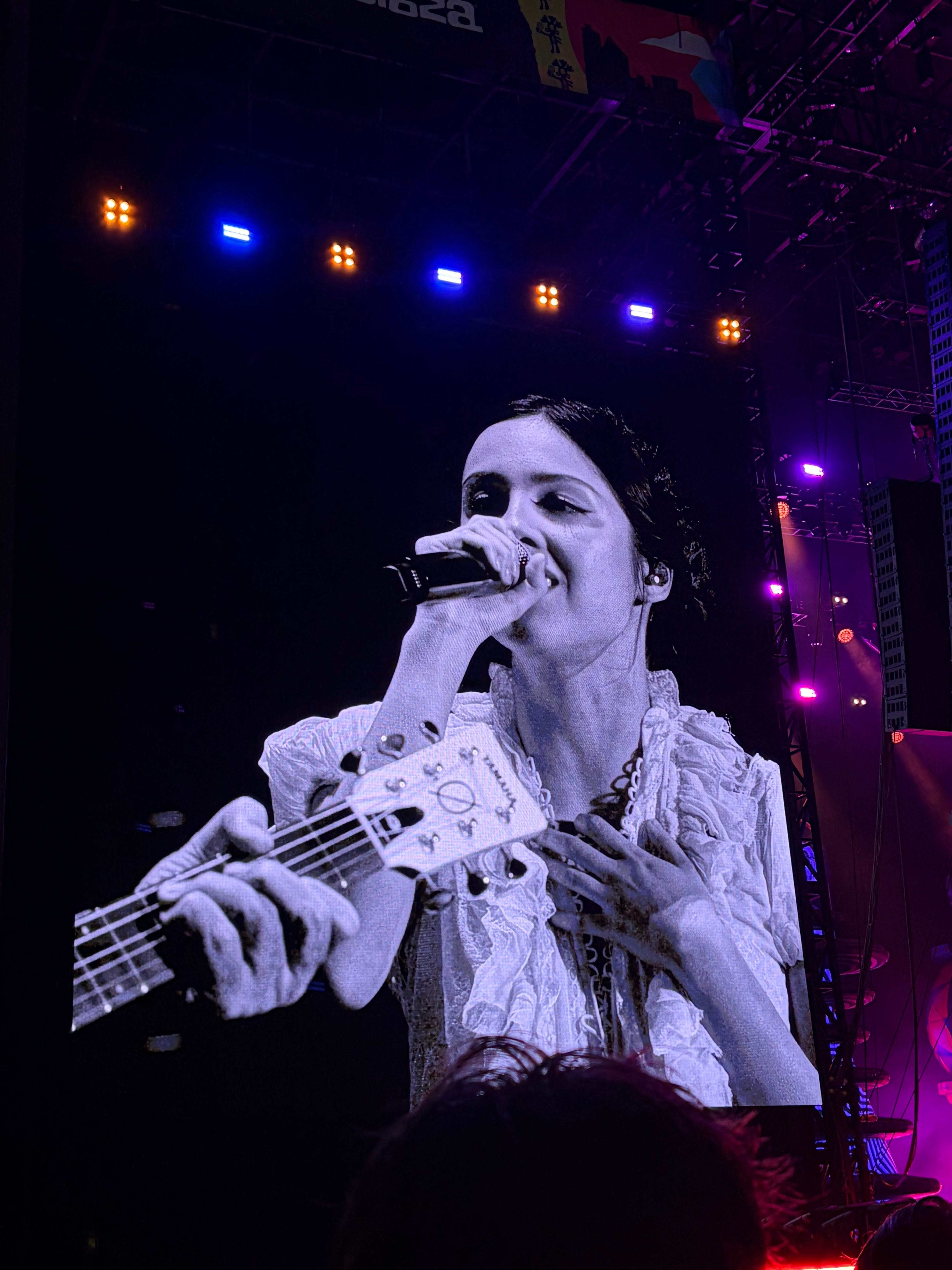 Click to open the image gallery Olivia Rodrigo performing on stage at Lollapalooza during The Smashing Pumpkins set