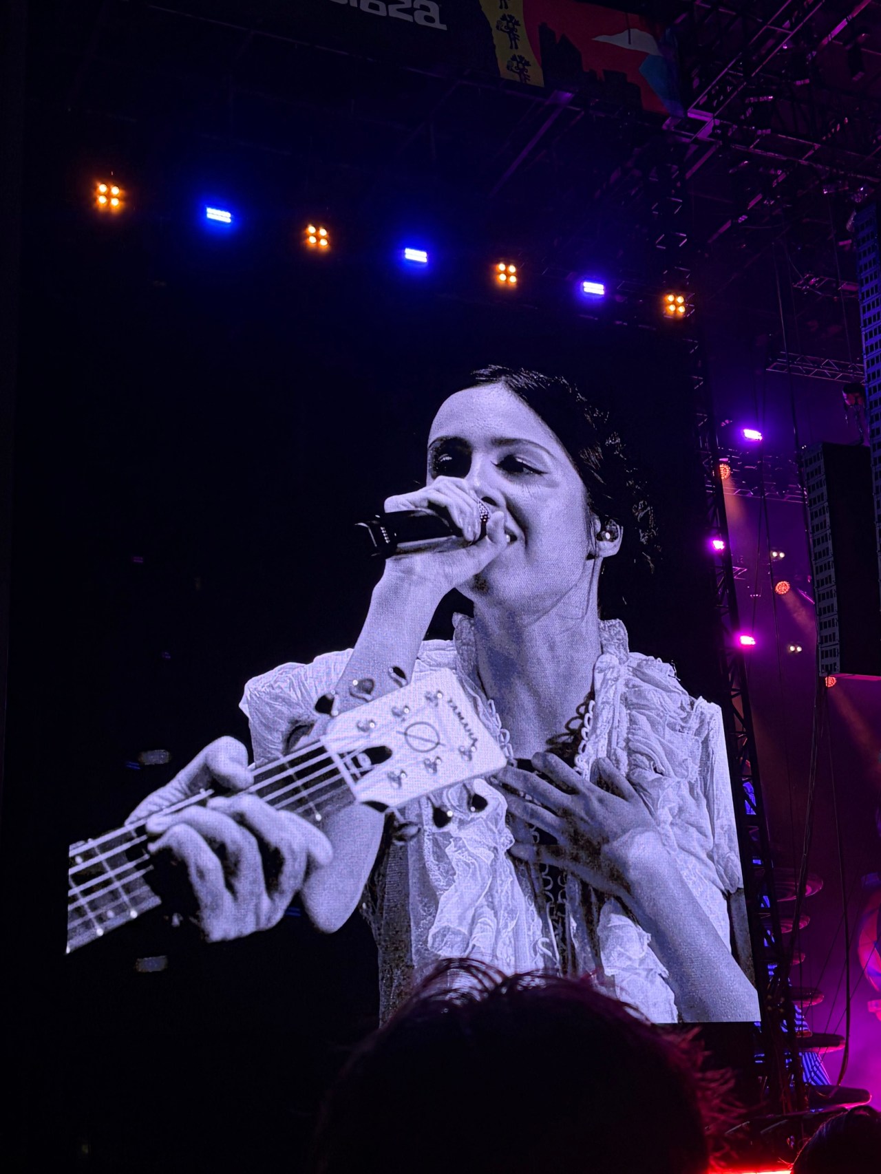 Olivia Rodrigo performing on stage at Lollapalooza during The Smashing Pumpkins set