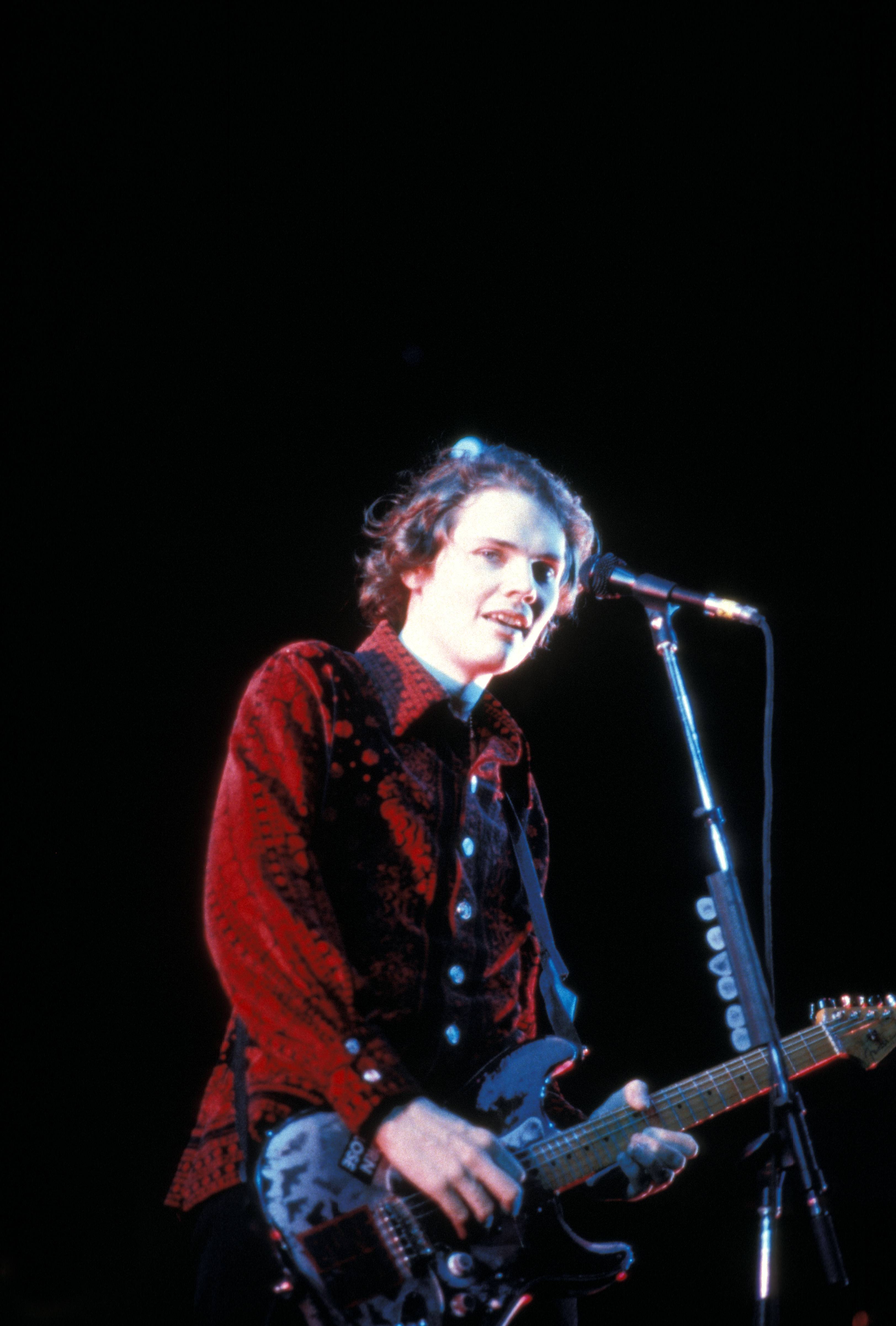 Click to open the image gallery Smashing Pumpkins performing live at Lollapalooza in 1994