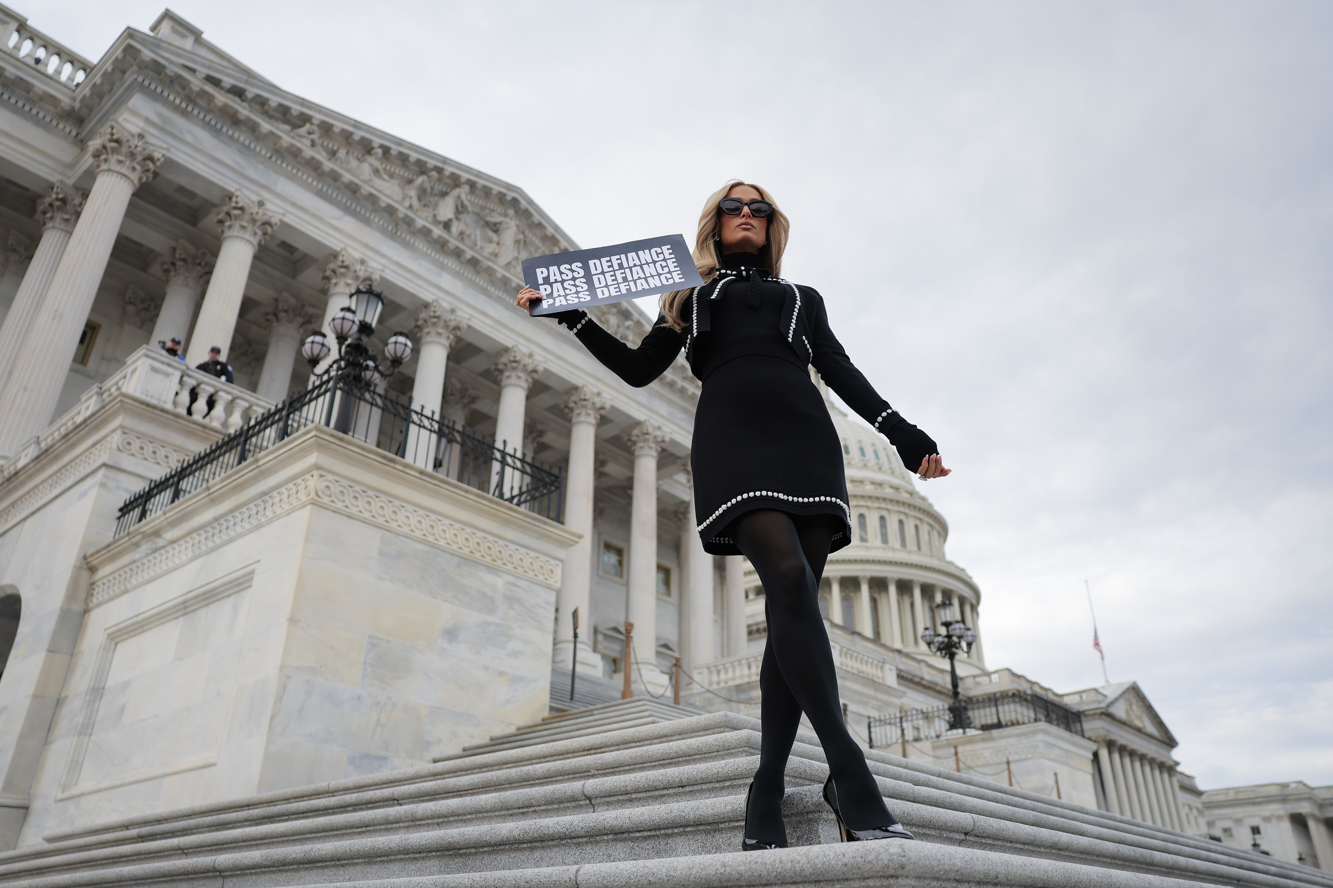 Paris Hilton standing outside the U.S. Capitol building after a press conference supporting the DEFIANCE Act
