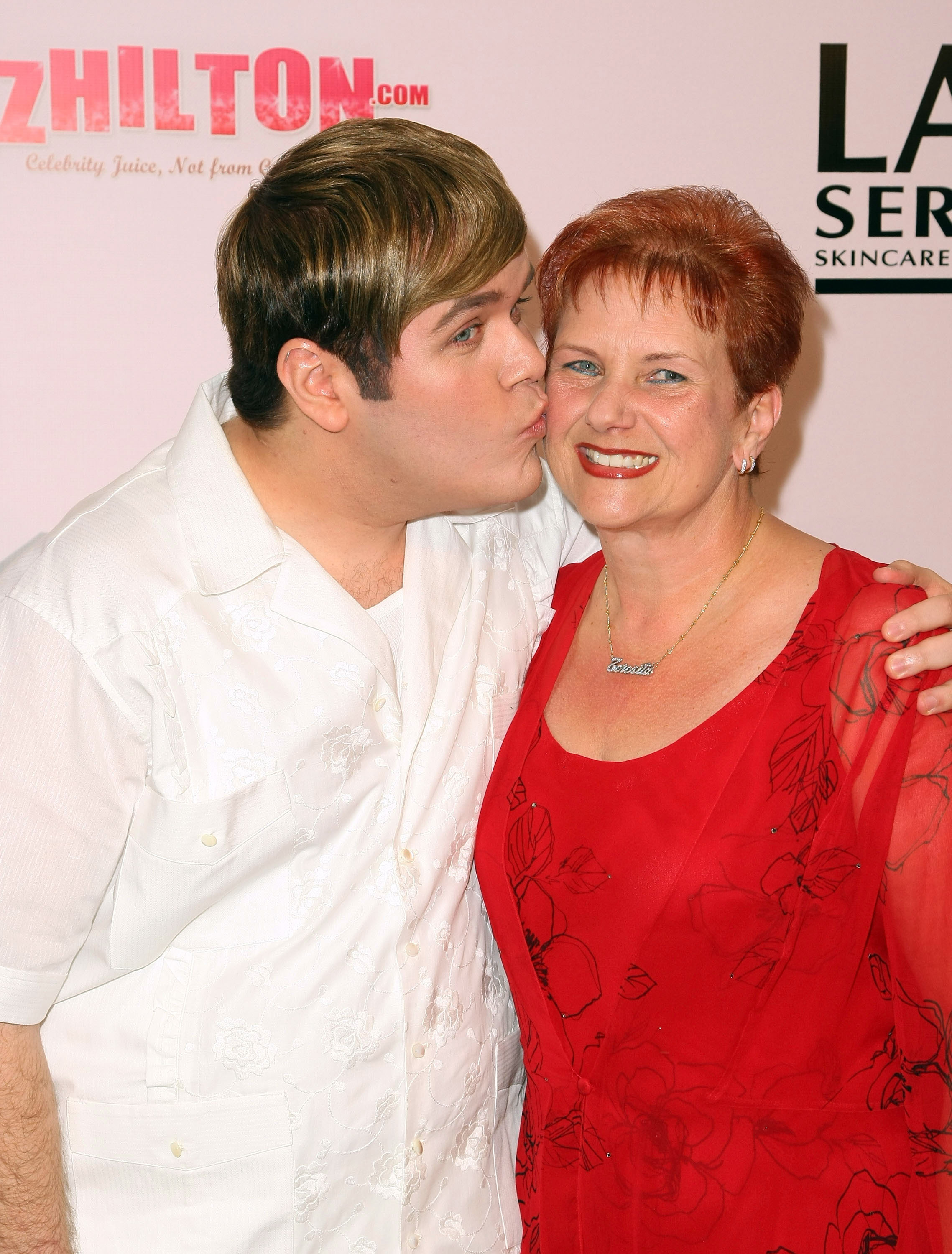 Perez Hilton and his mother Teresita at his 30th birthday party at the Beverly Wilshire Hotel