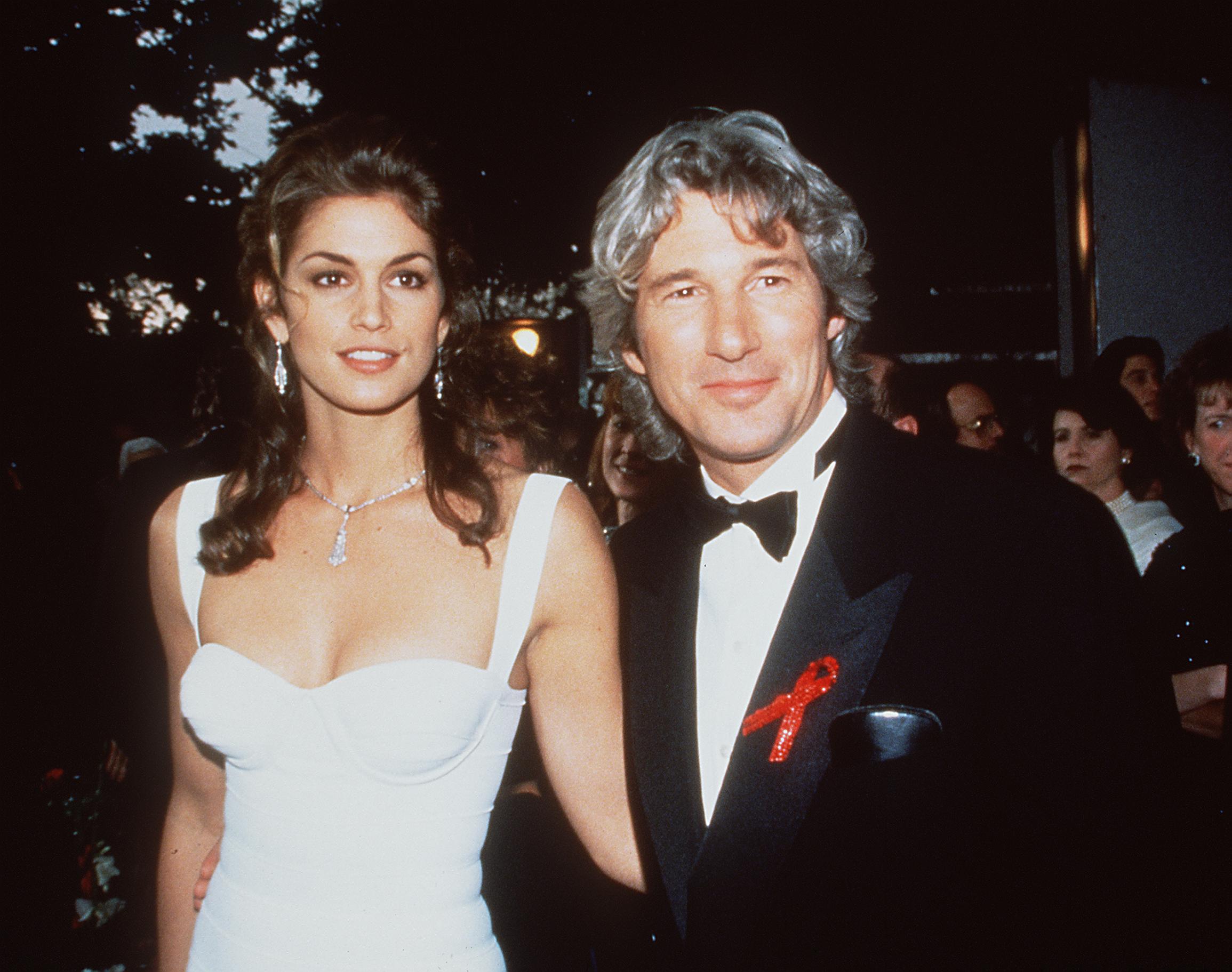 Cindy Crawford and Richard Gere posing together in 1993