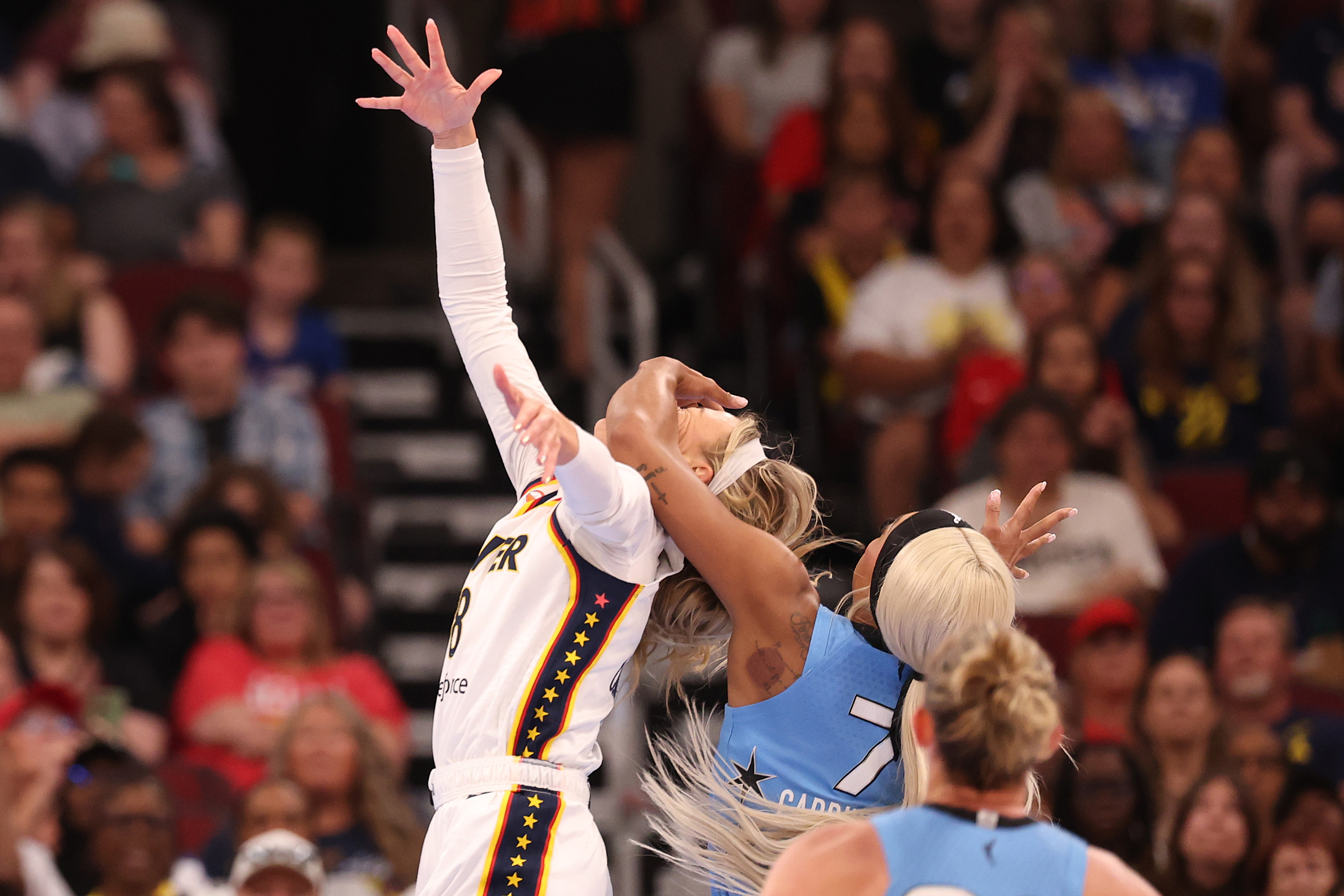 DiJonai Carrington fouling Sophie Cunningham during the Indiana Fever vs. Chicago Sky game at United Center