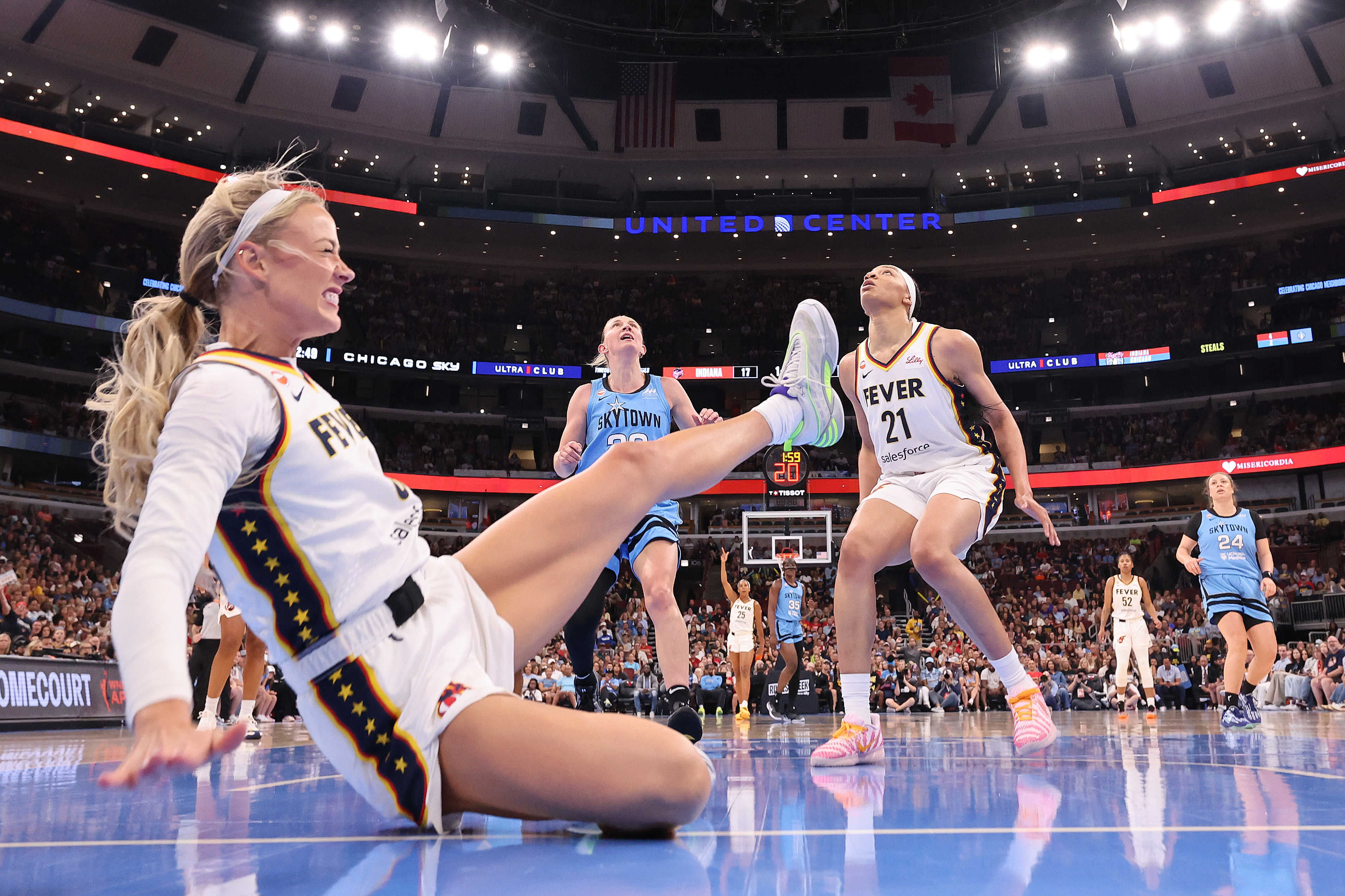 Sophie Cunningham reacting after being fouled by DiJonai Carrington during an Indiana Fever vs. Chicago Sky game at United Center