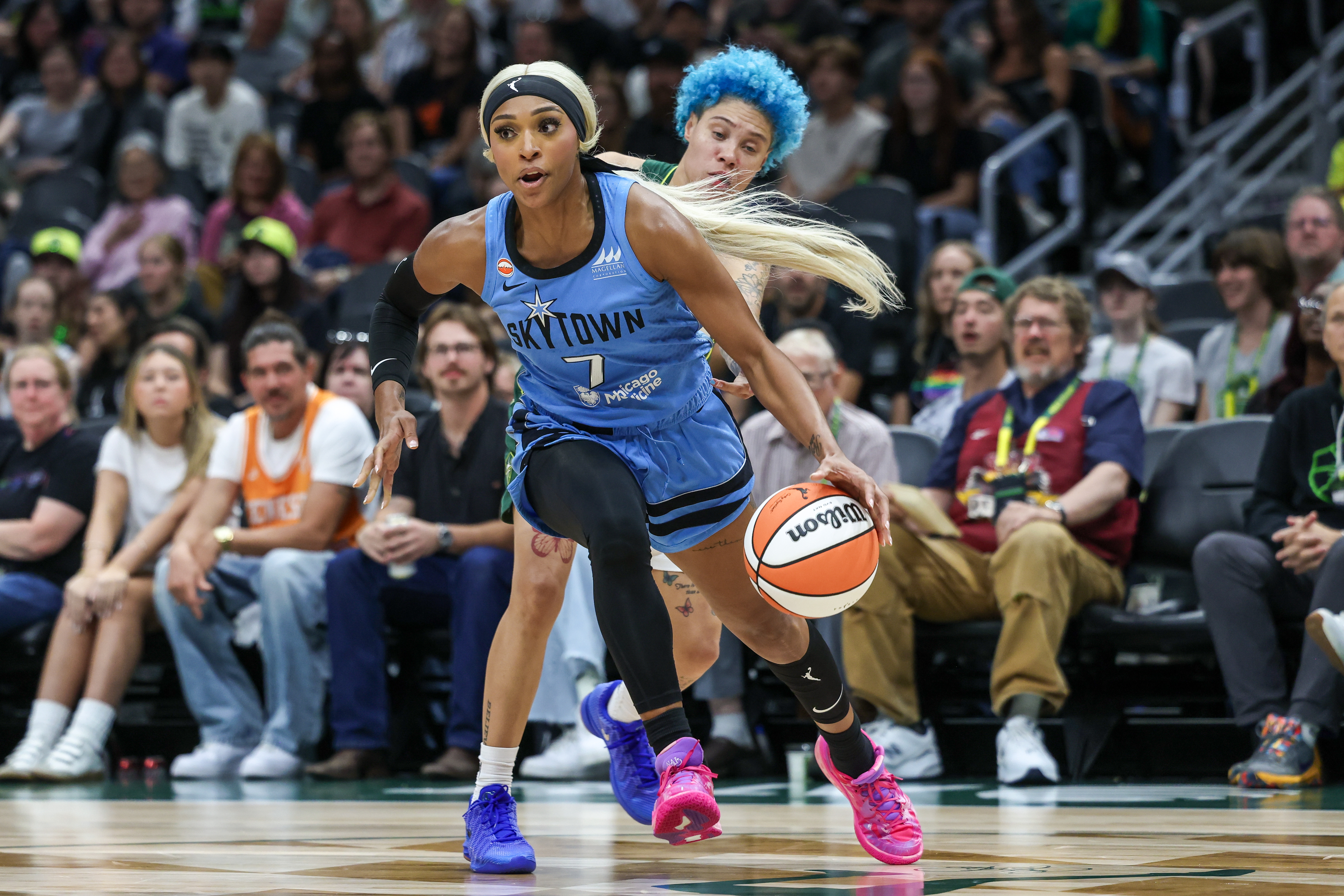 DiJonai Carrington #7 of the Chicago Sky dribbling the ball during a WNBA game against the Seattle Storm