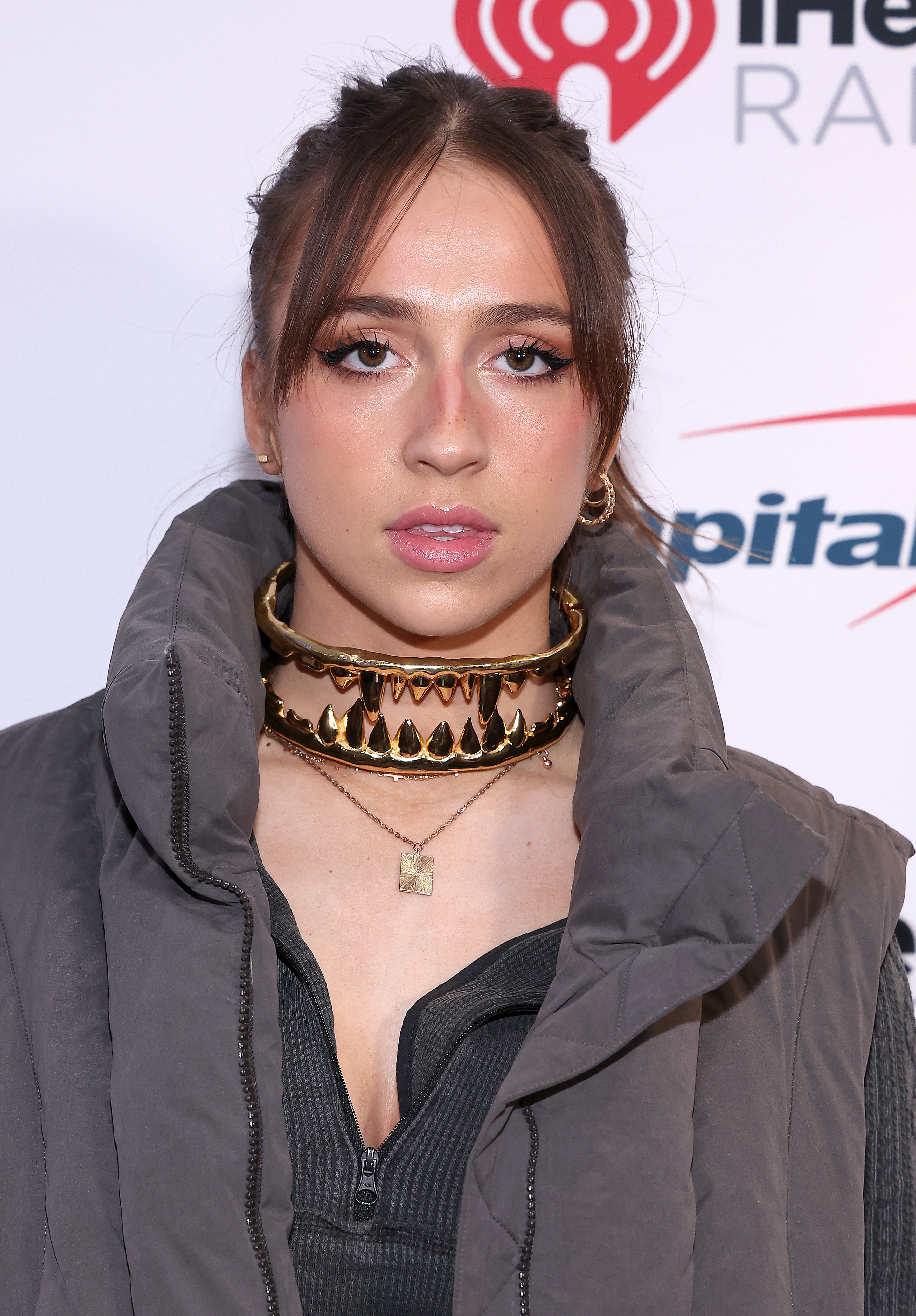 Click to open the image gallery Tate McRae on the red carpet at iHeartRadio Jingle Ball 2022 at Capital One Arena in Washington, DC