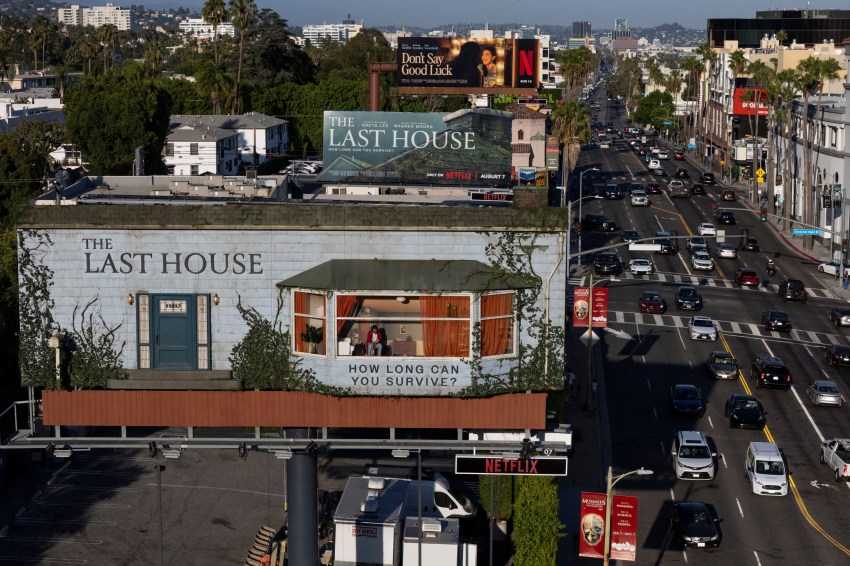 The Guy Living in a Netflix Billboard 30 Feet Over Sunset Boulevard Isn’t Even in the Movie He’s Promoting