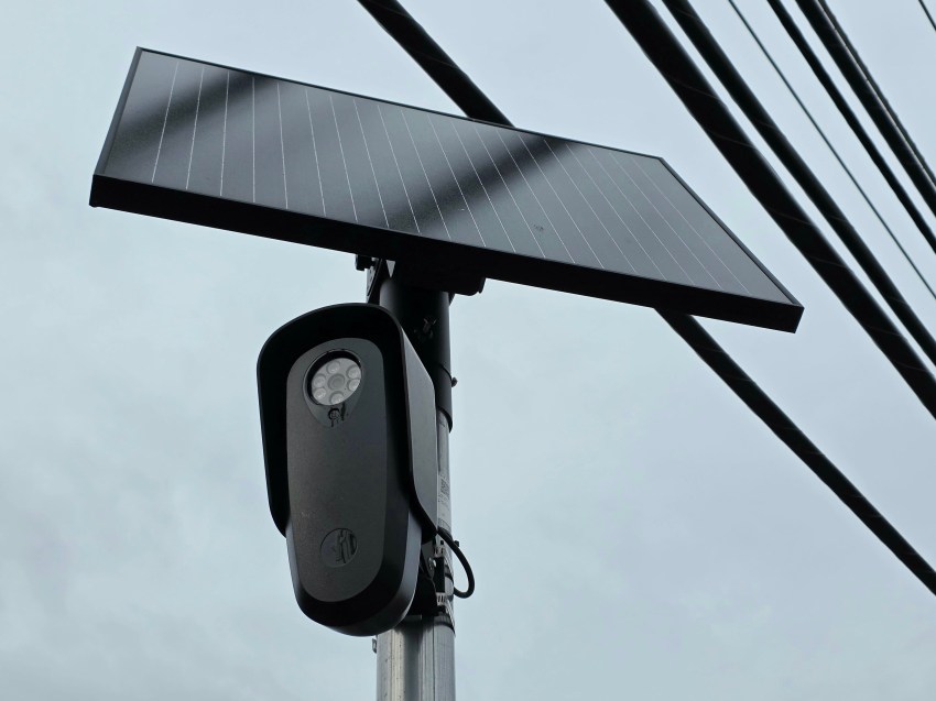A Flock Safety license-plate reading camera mounted on a pole along State Road in Rehoboth Beach