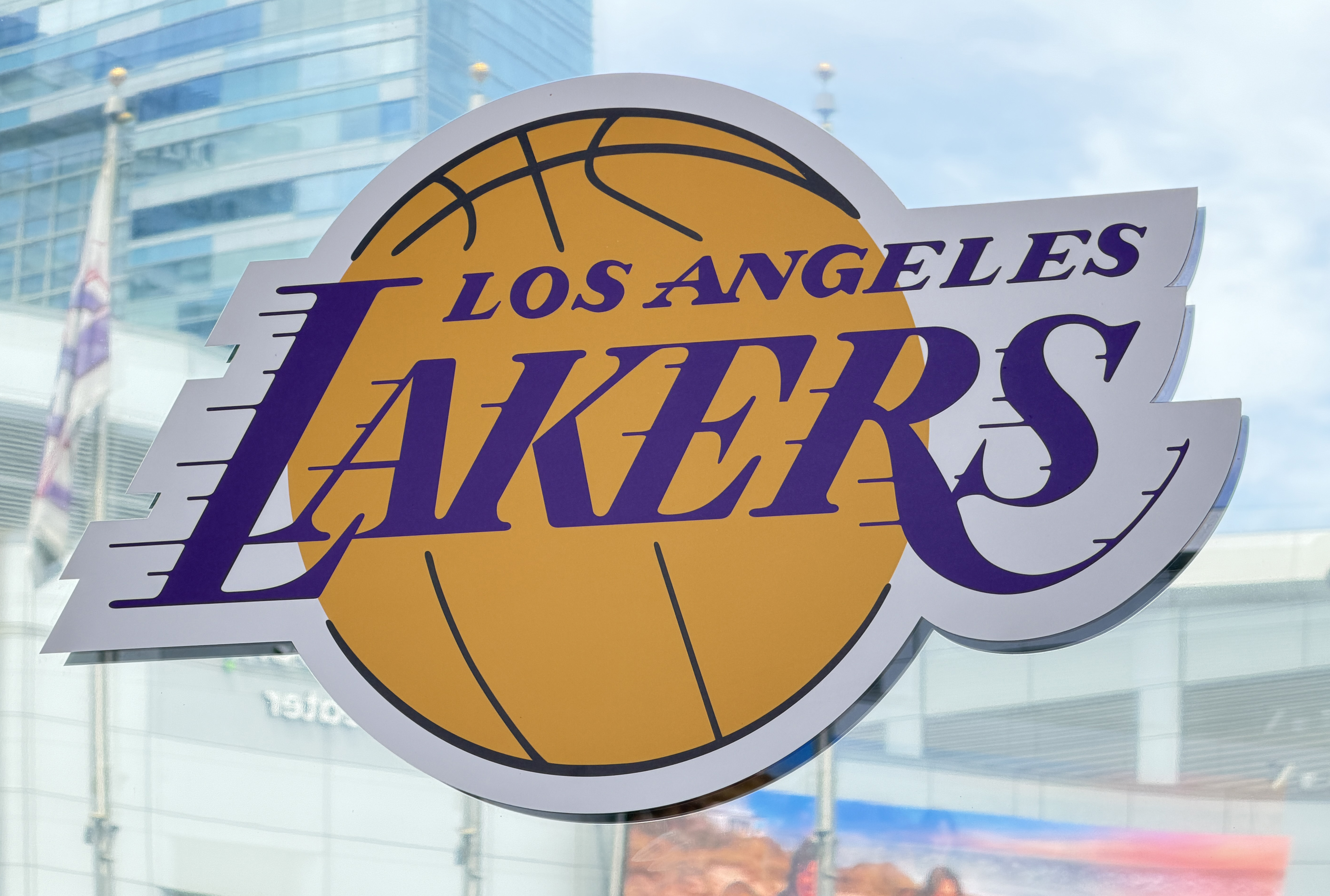The Los Angeles Lakers logo displayed on the exterior of Crypto.com Arena in Los Angeles.