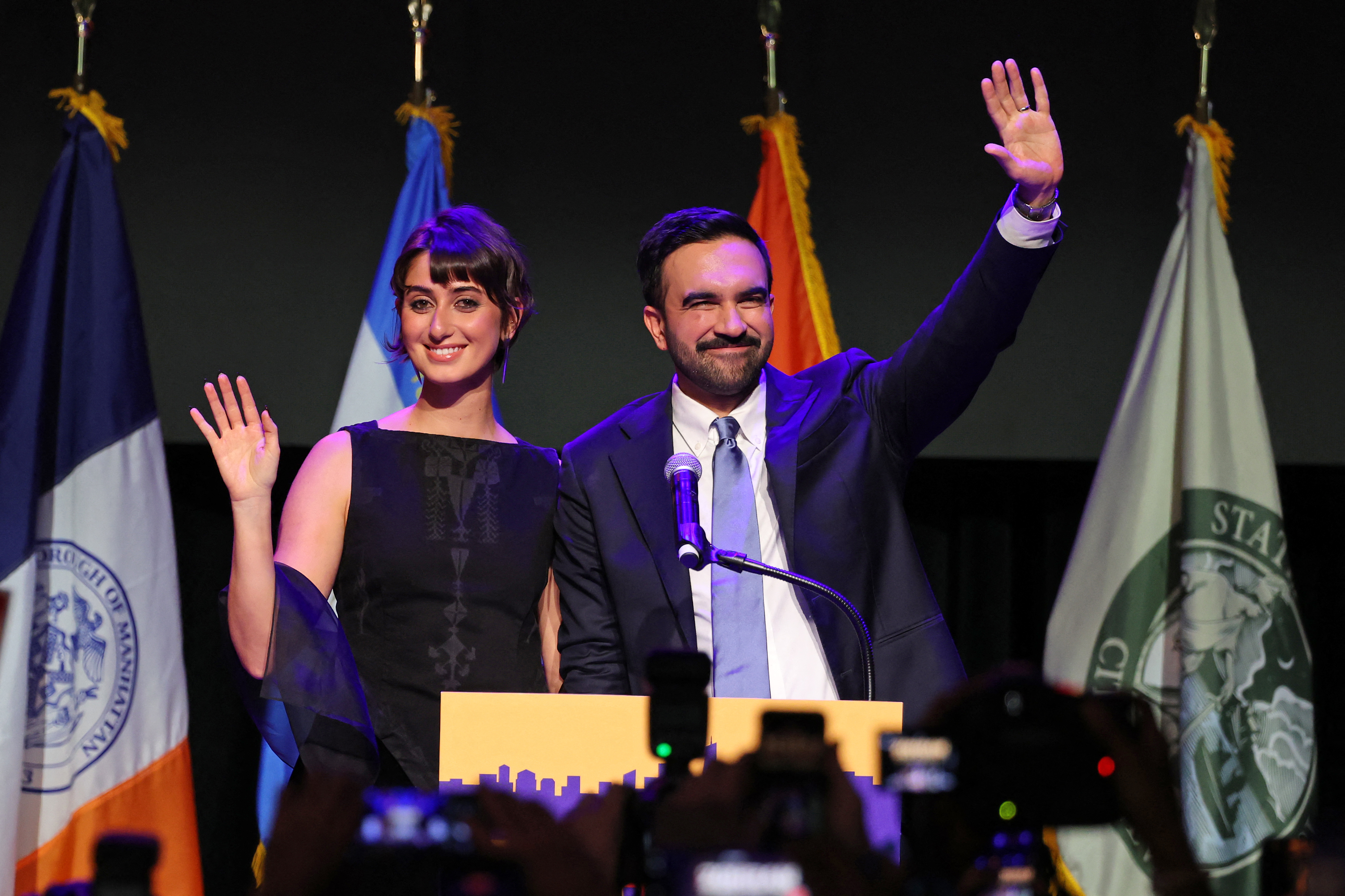 Zohran Mamdani and Rama Duwaji celebrating together at an election night event at the Brooklyn Paramount Theater